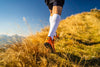 Running with 20-30 mmHg Compression socks to boost blood flow, reduce soreness, enhance recovery, and reach new heights.