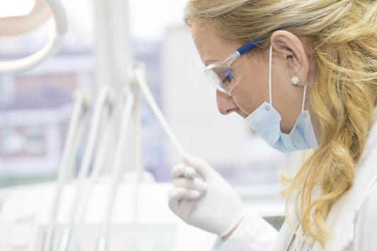 Image shows a nurse standing while working. Compression Socks with a Zipper: A Must-Have for Nurses and Healthcare Workers